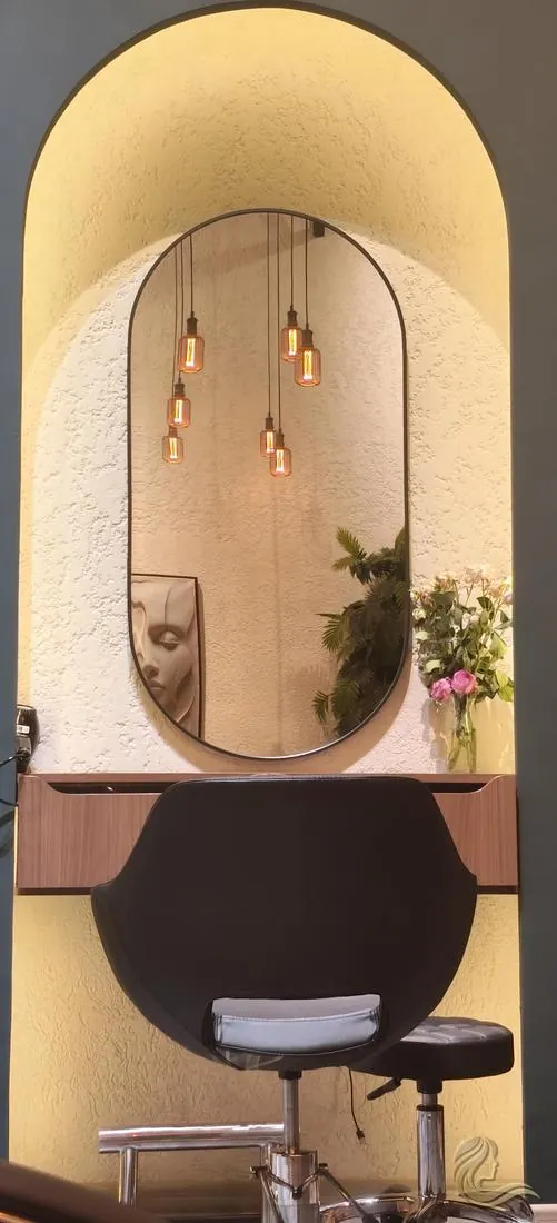 Arched mirror styling station